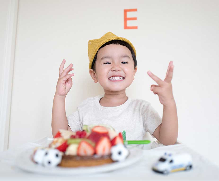 Image - Smiling Boy with Cake