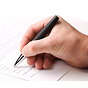 Image of a person filling out a form