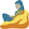 A person sitting in a beanbag
